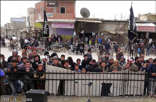 گروه تروریستی داعش دست جوان سوری را قطع کرد + (عکس ۱۸+)