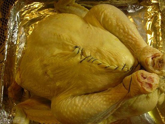 روش پخت مرغ شکم پر به طور کامل روش پخت مرغ شکم پر به طور کامل