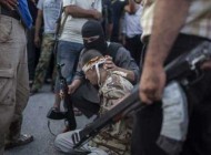 عکس سر بریدن یک سرباز سوری (18+)